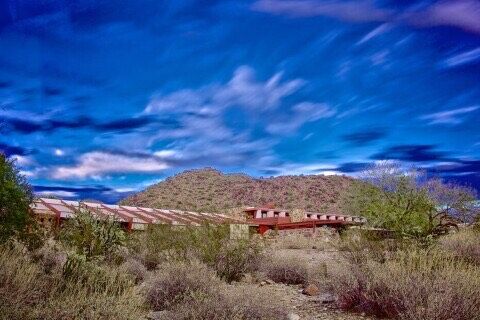 Arizona Landscape, dramatic blue sky over a futuristic building
