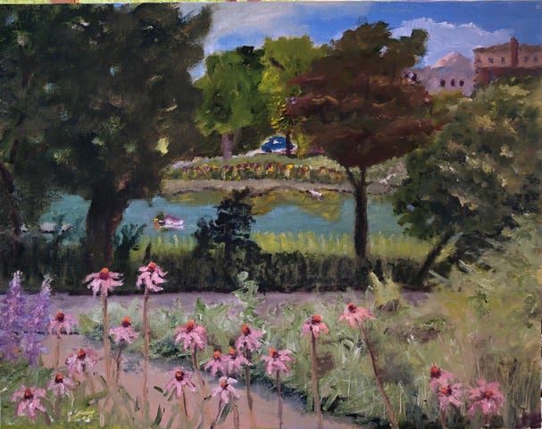 A watercolor of flowers and a lake