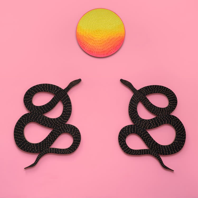 Two abstract snakes below a sun 