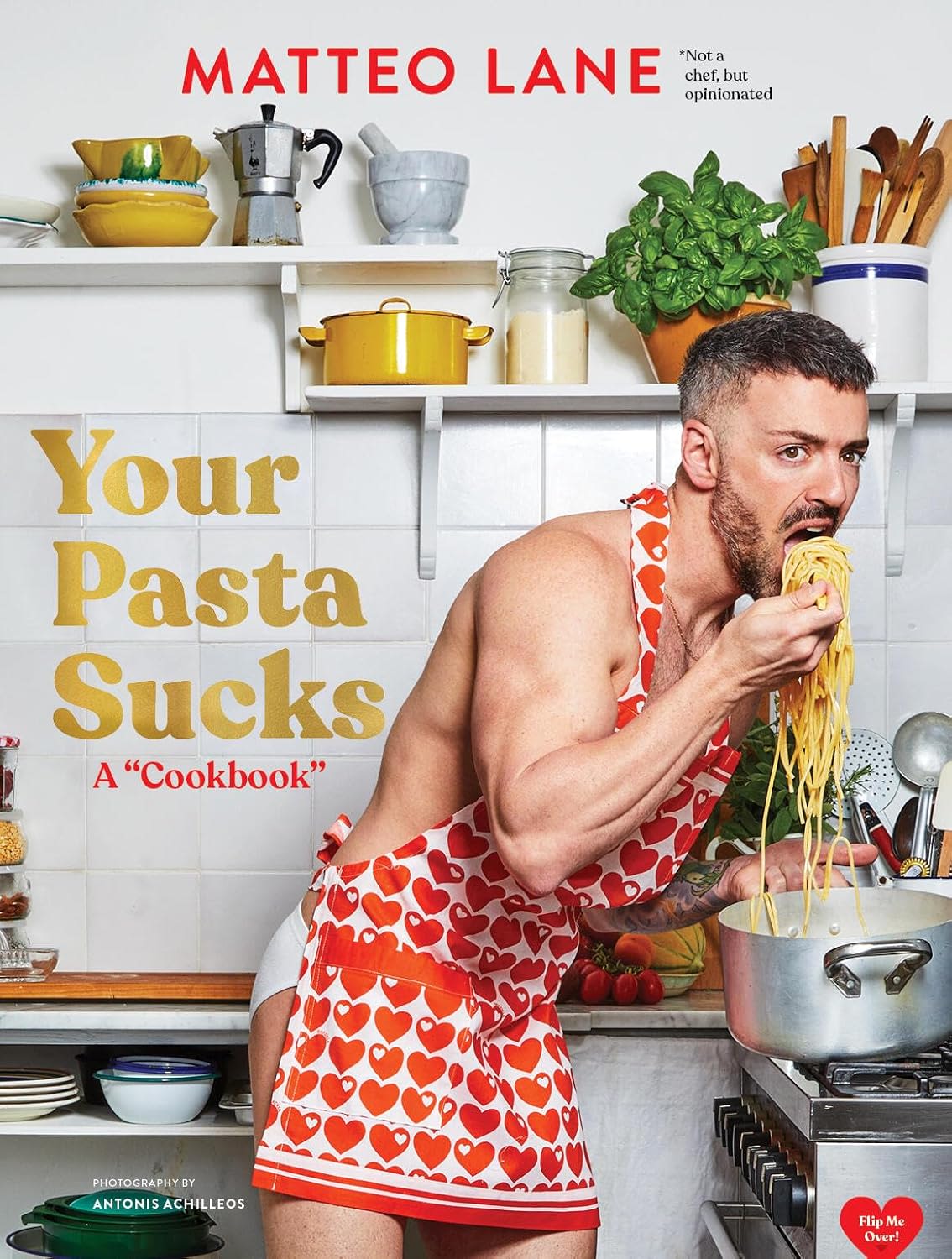 A cookbook cover featuring Matteo eating pasta with his hands