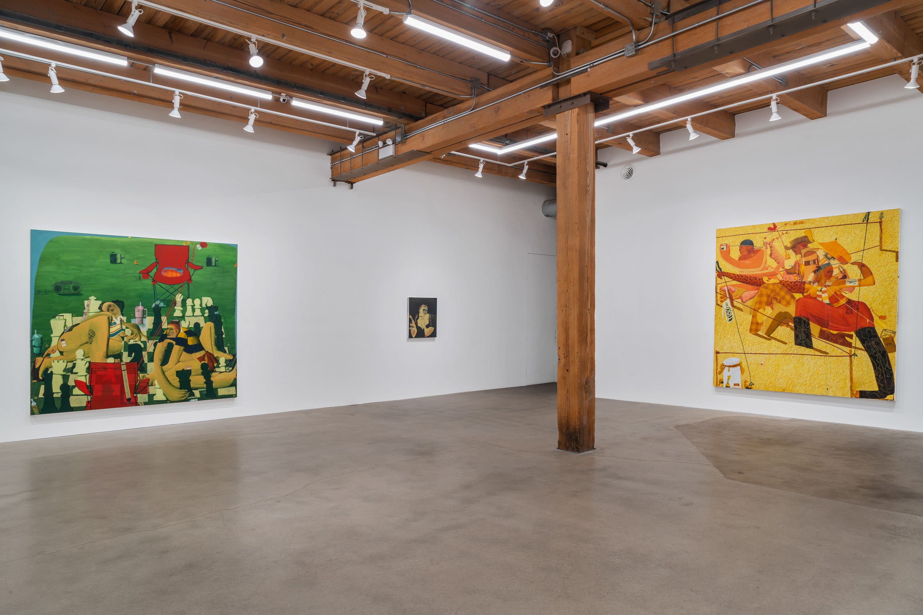 An installation view with several paintings