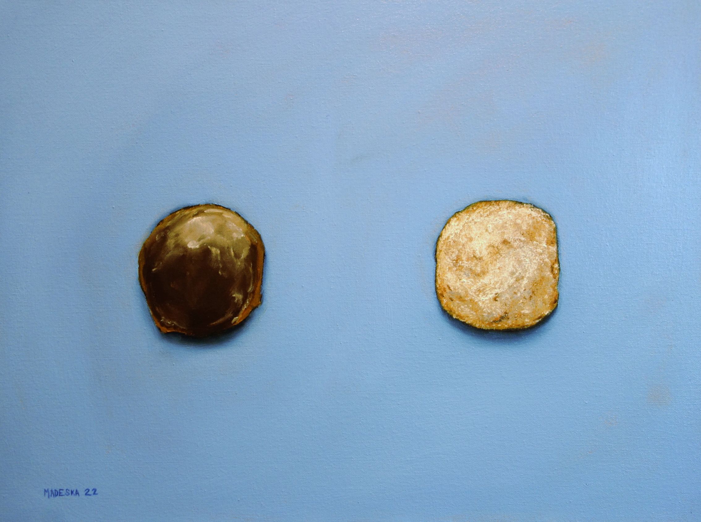 A painting of two paczki