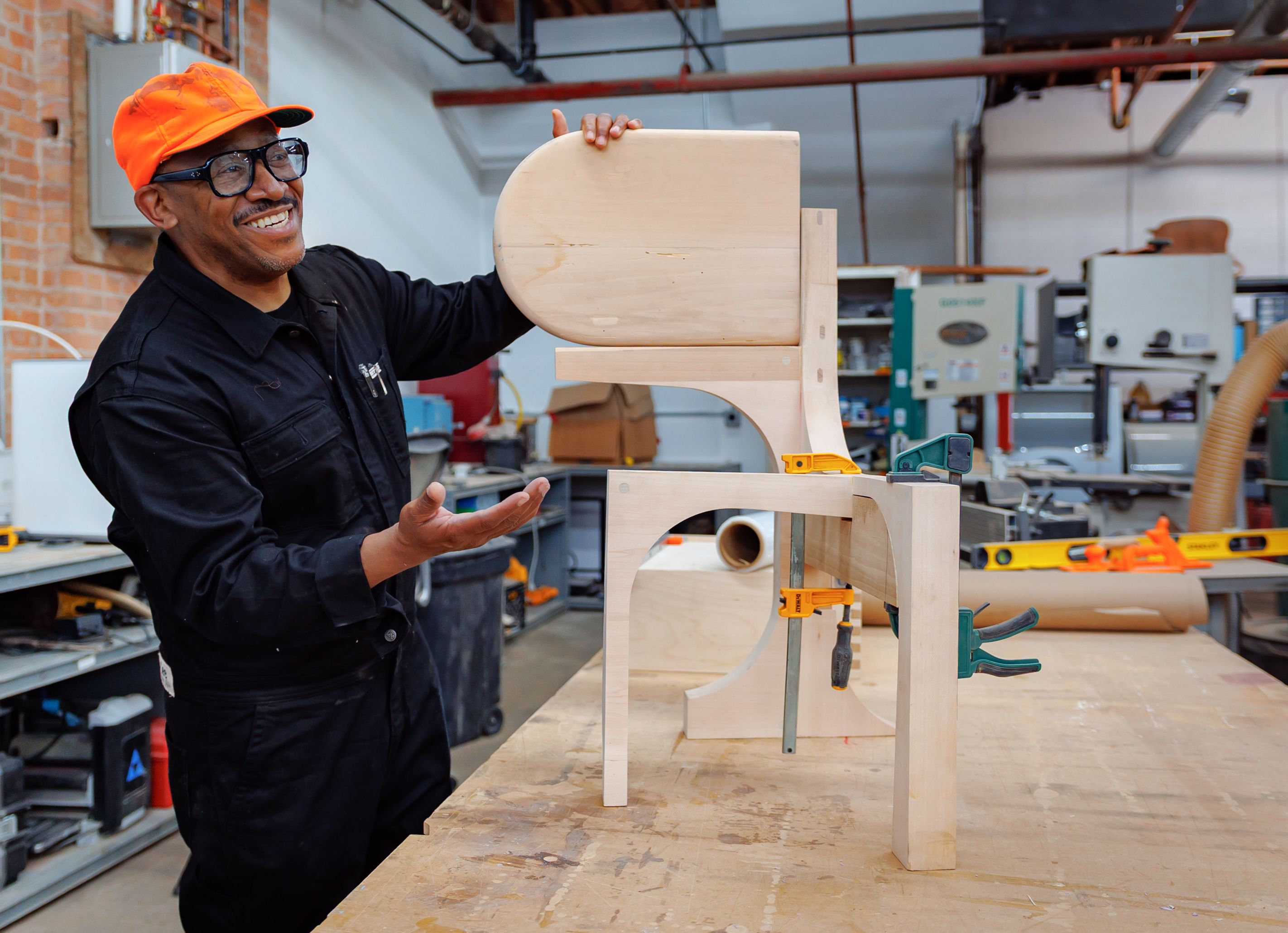 Norman Teague constructing a chair in his studio 