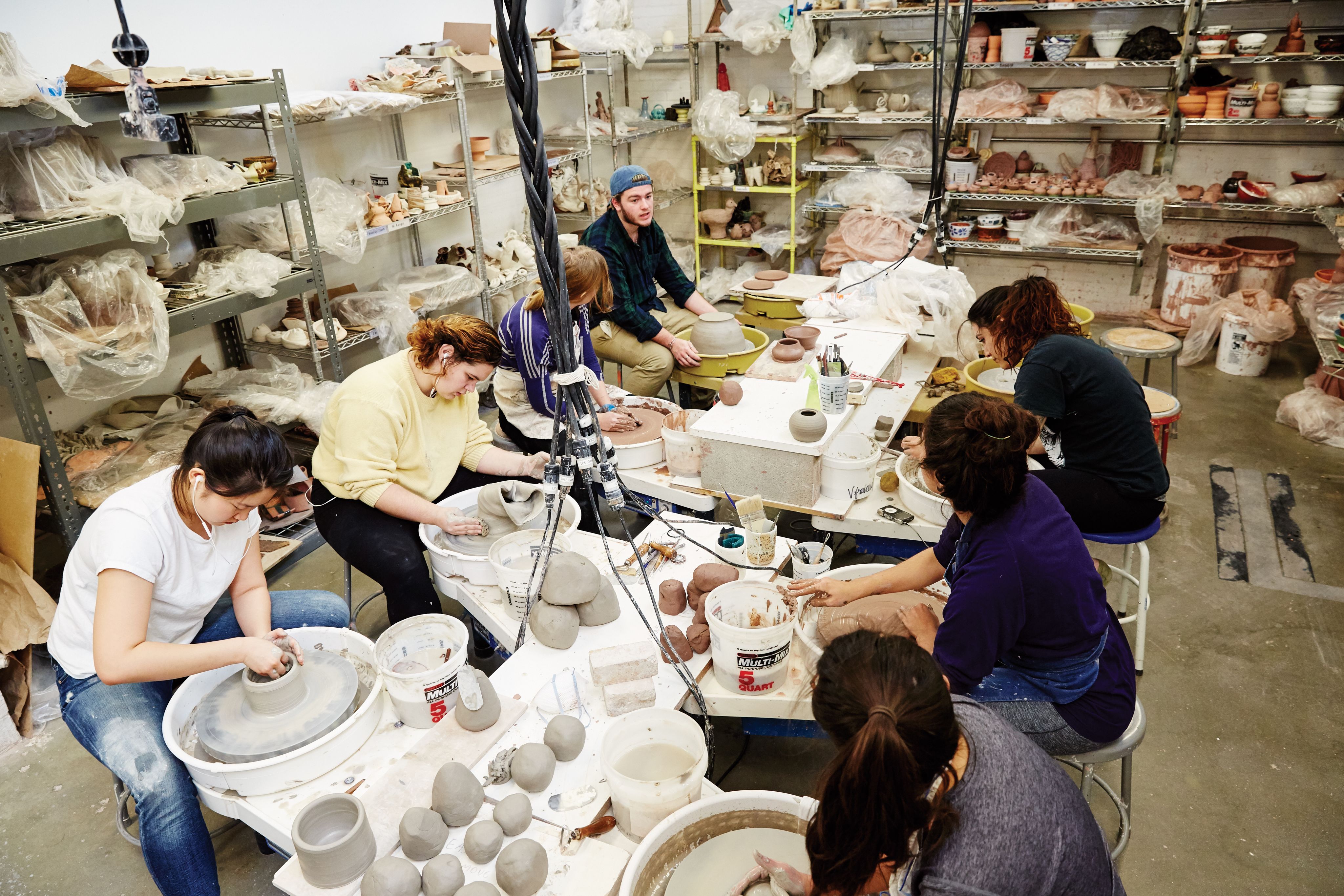 Students in a ceramic studio 
