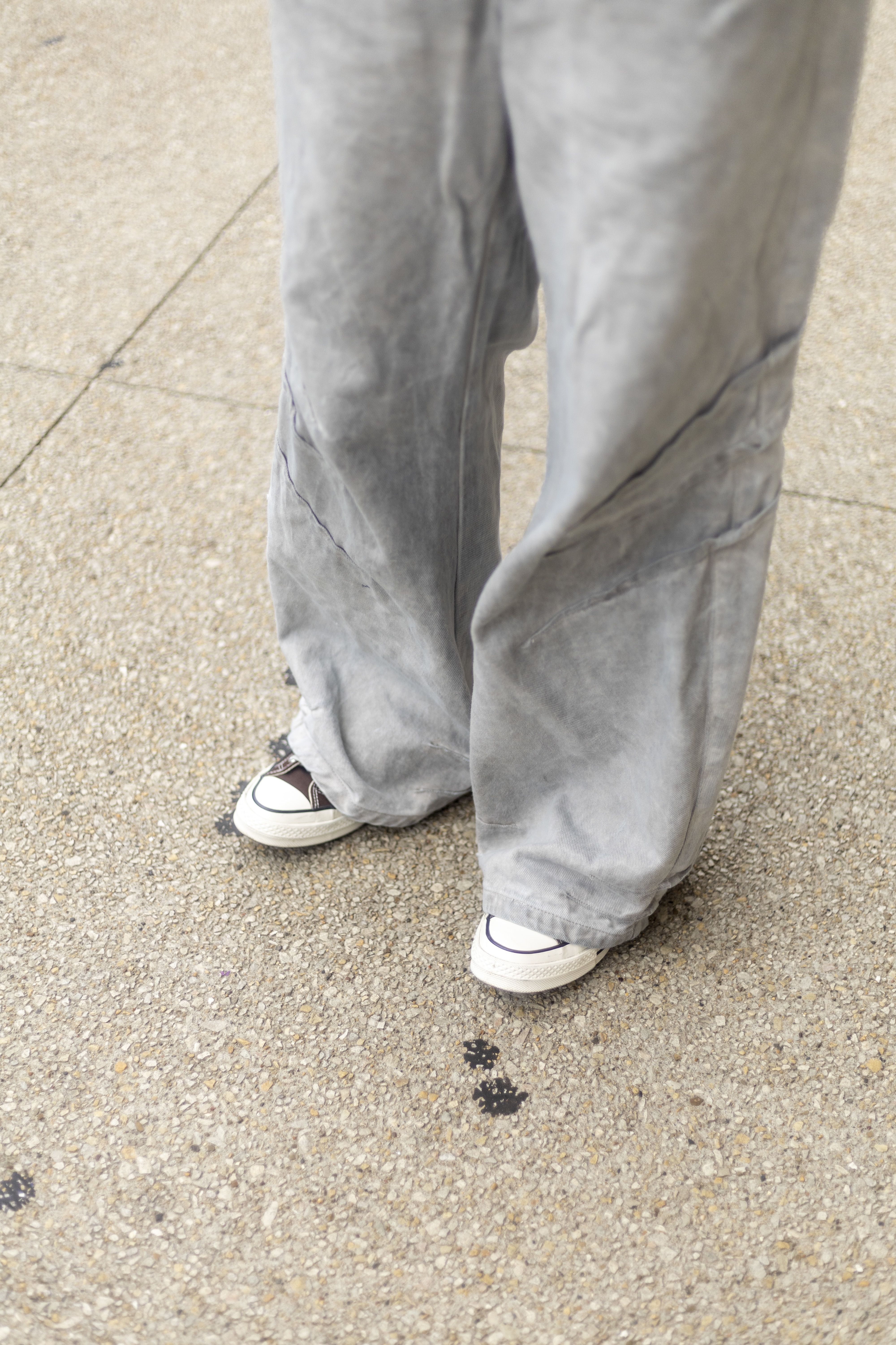 Grey pants with chuck taylors
