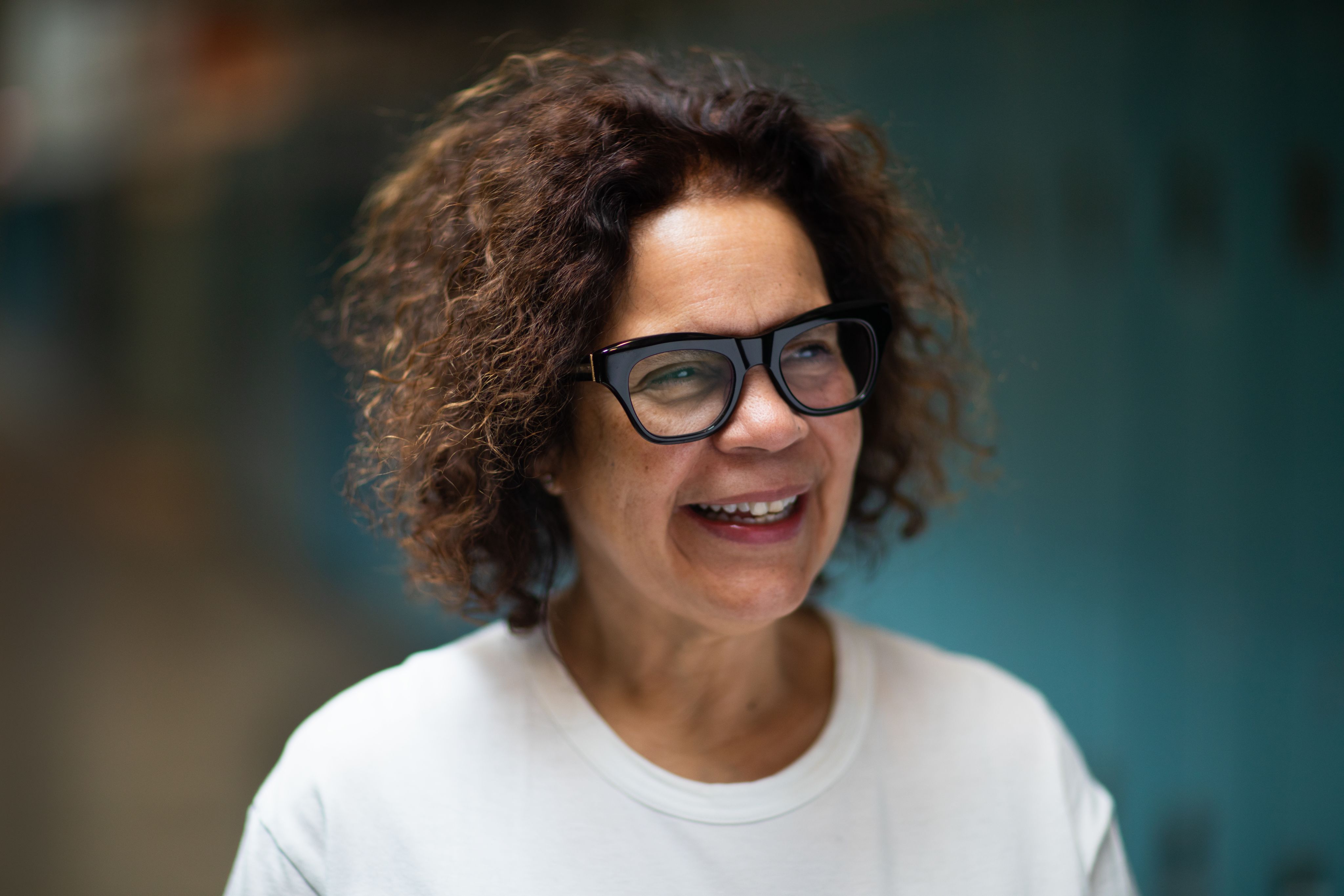 A portrait shot of Candida Alvarez smiling