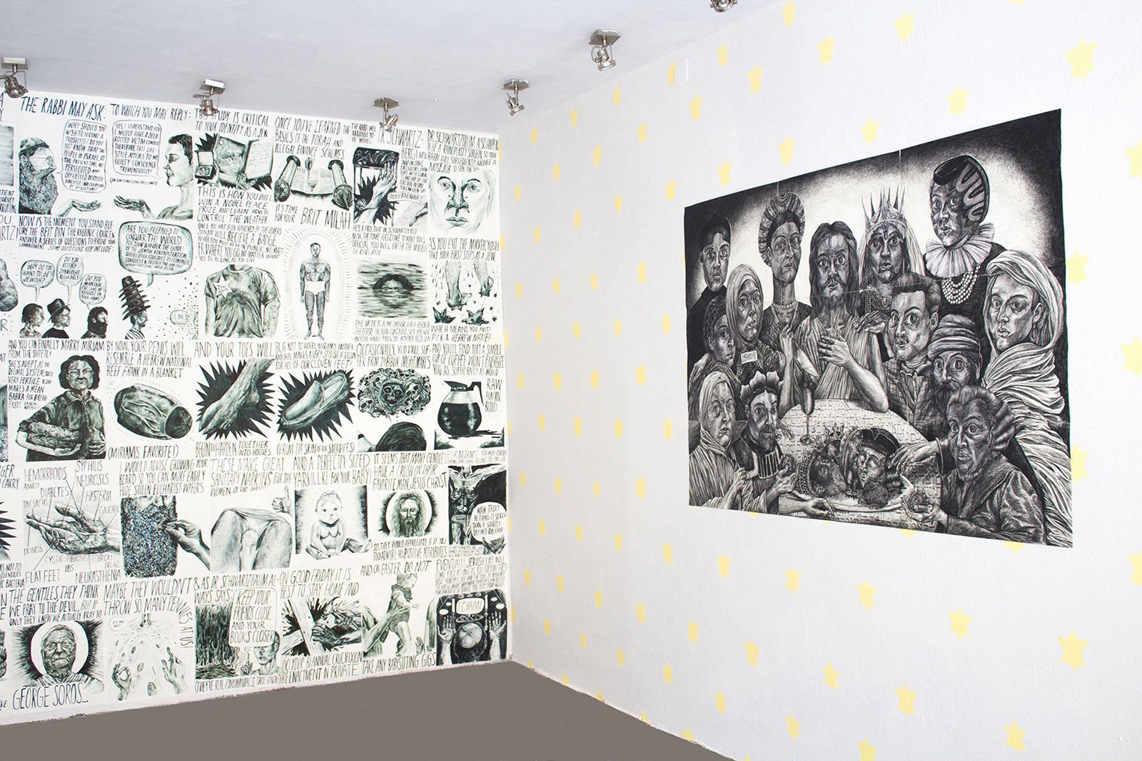 A gallery with black and white drawn images of figures and items on the walls