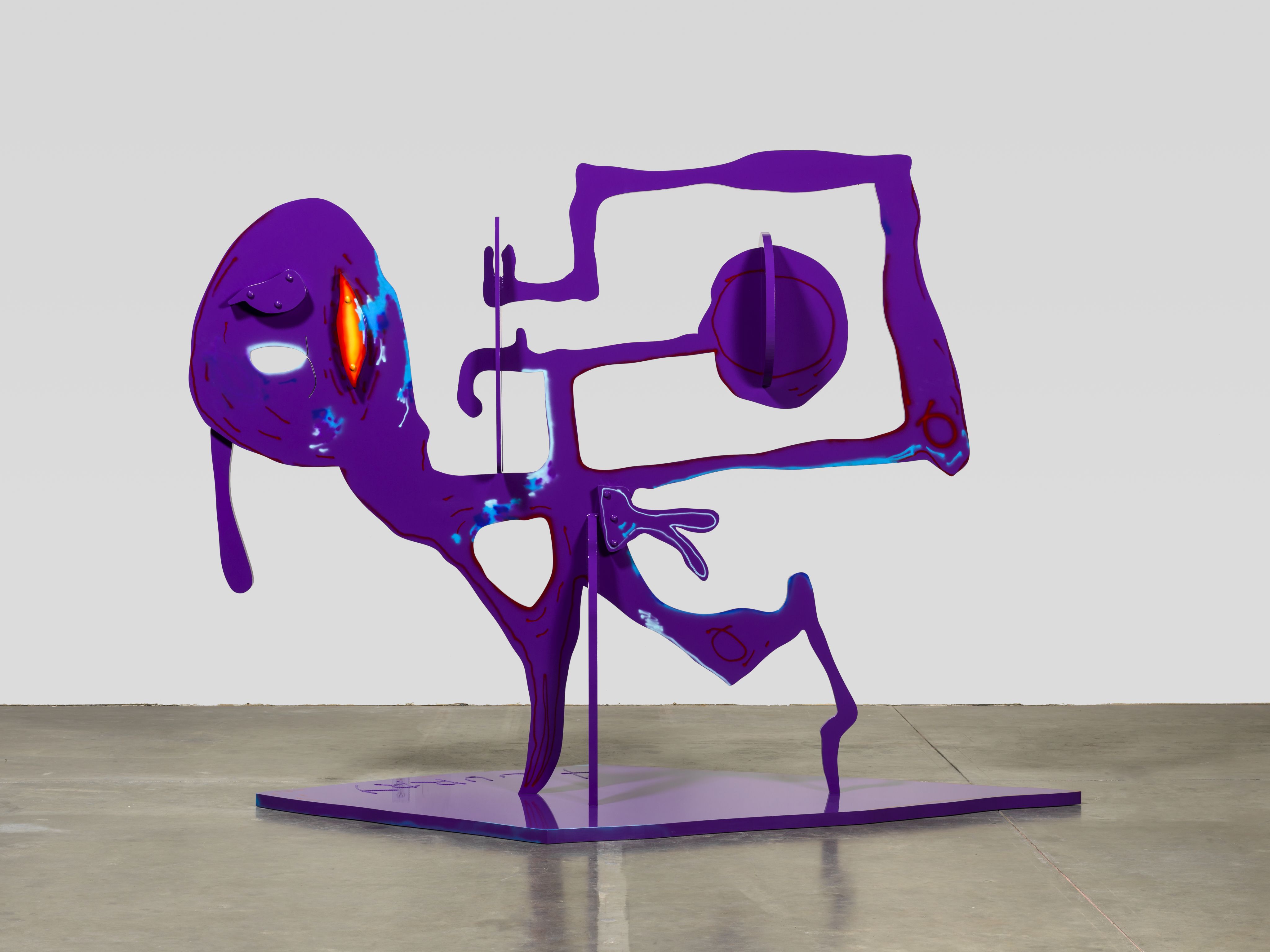 A drippy purple sculpture in a gallery