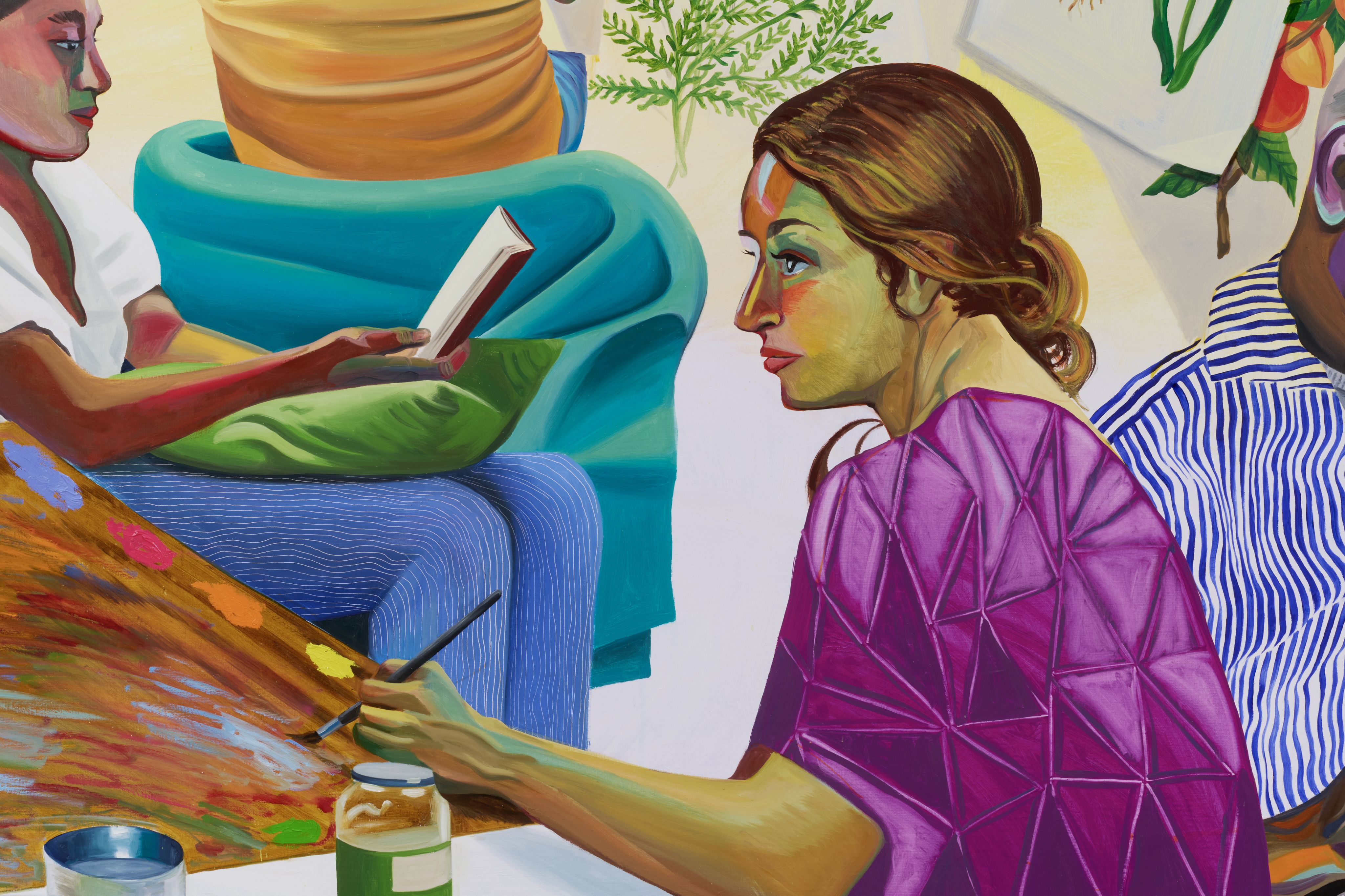 A mural featuring people engaged in reading and artistic pursuits