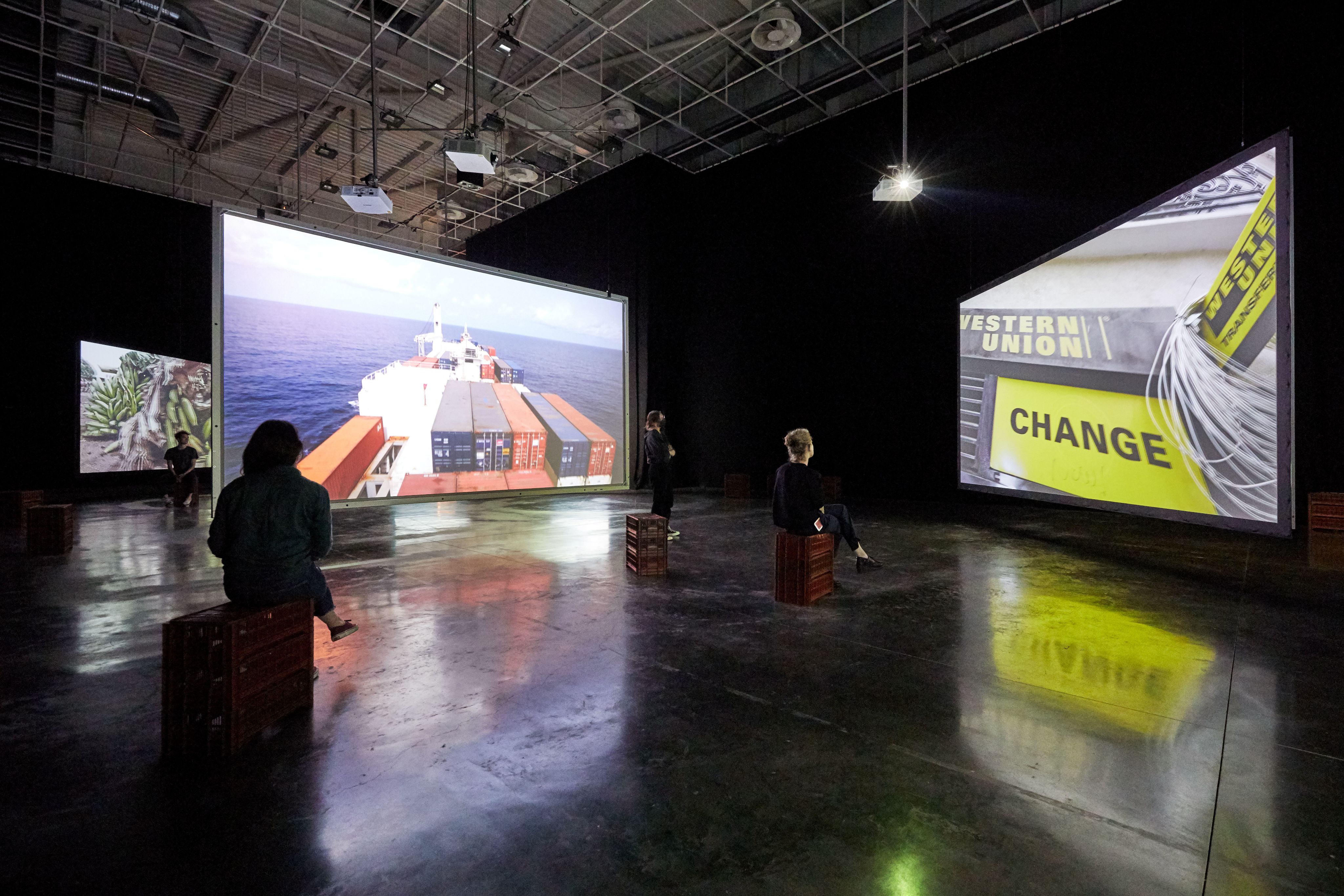 An installation of screens in a large gallery space