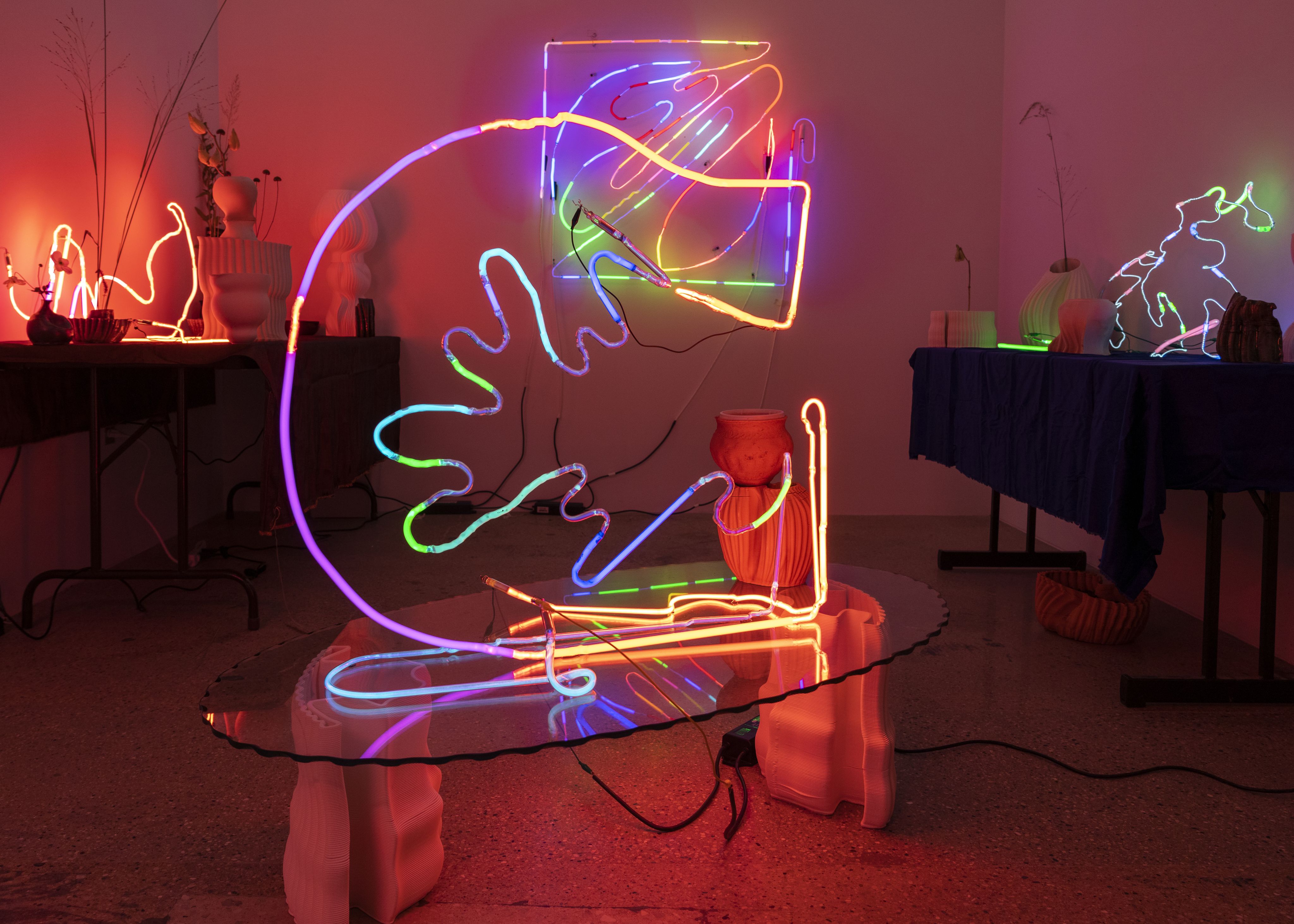 A neon sculpture of an exoskeleton.
