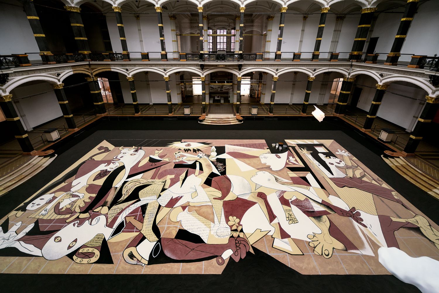 A mural on the floor of a large room