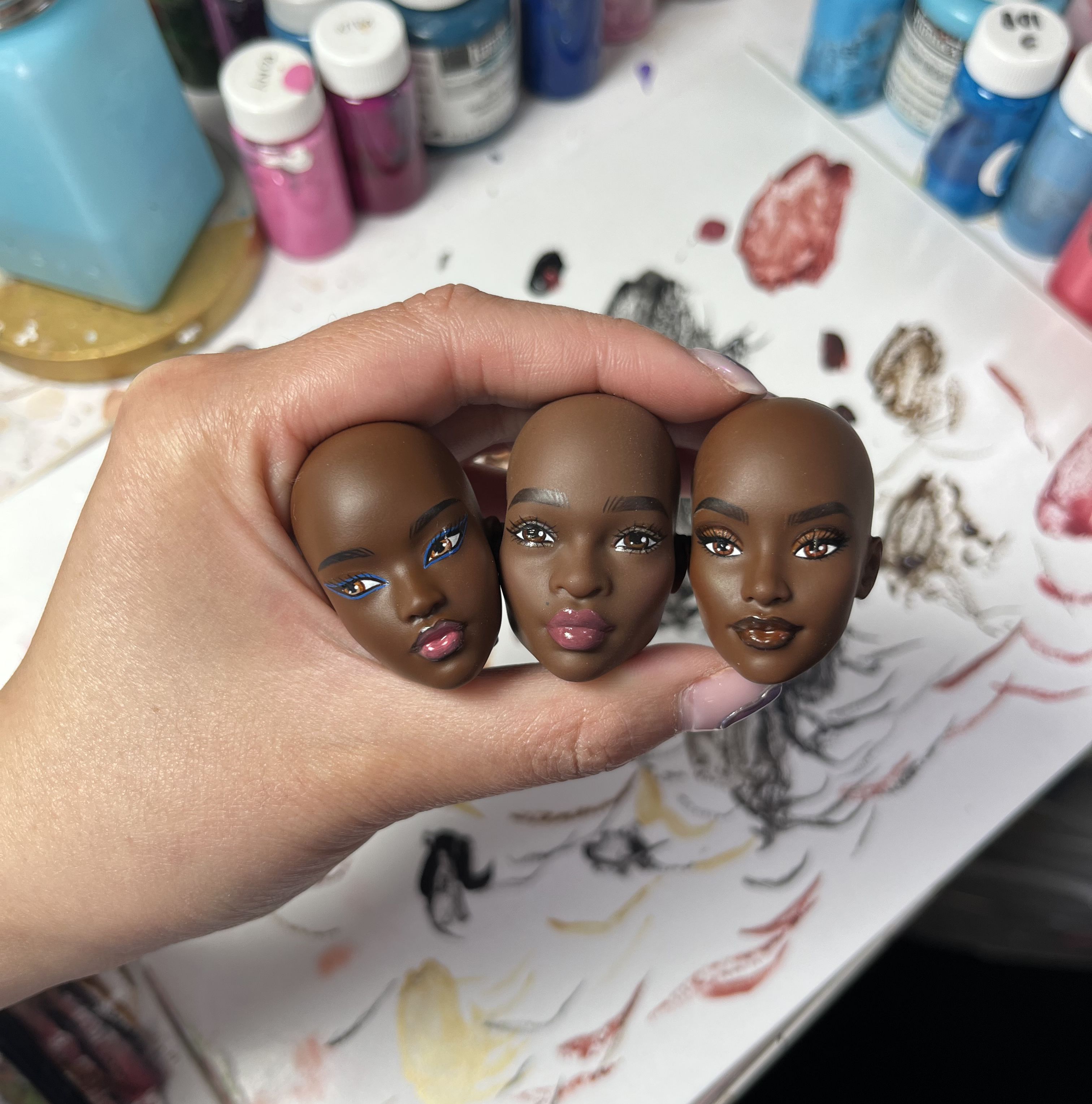 Three Barbie heads