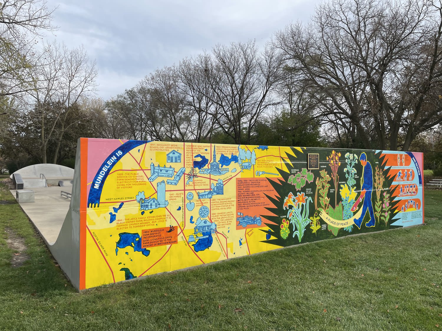 A brightly painted mural at a skate park