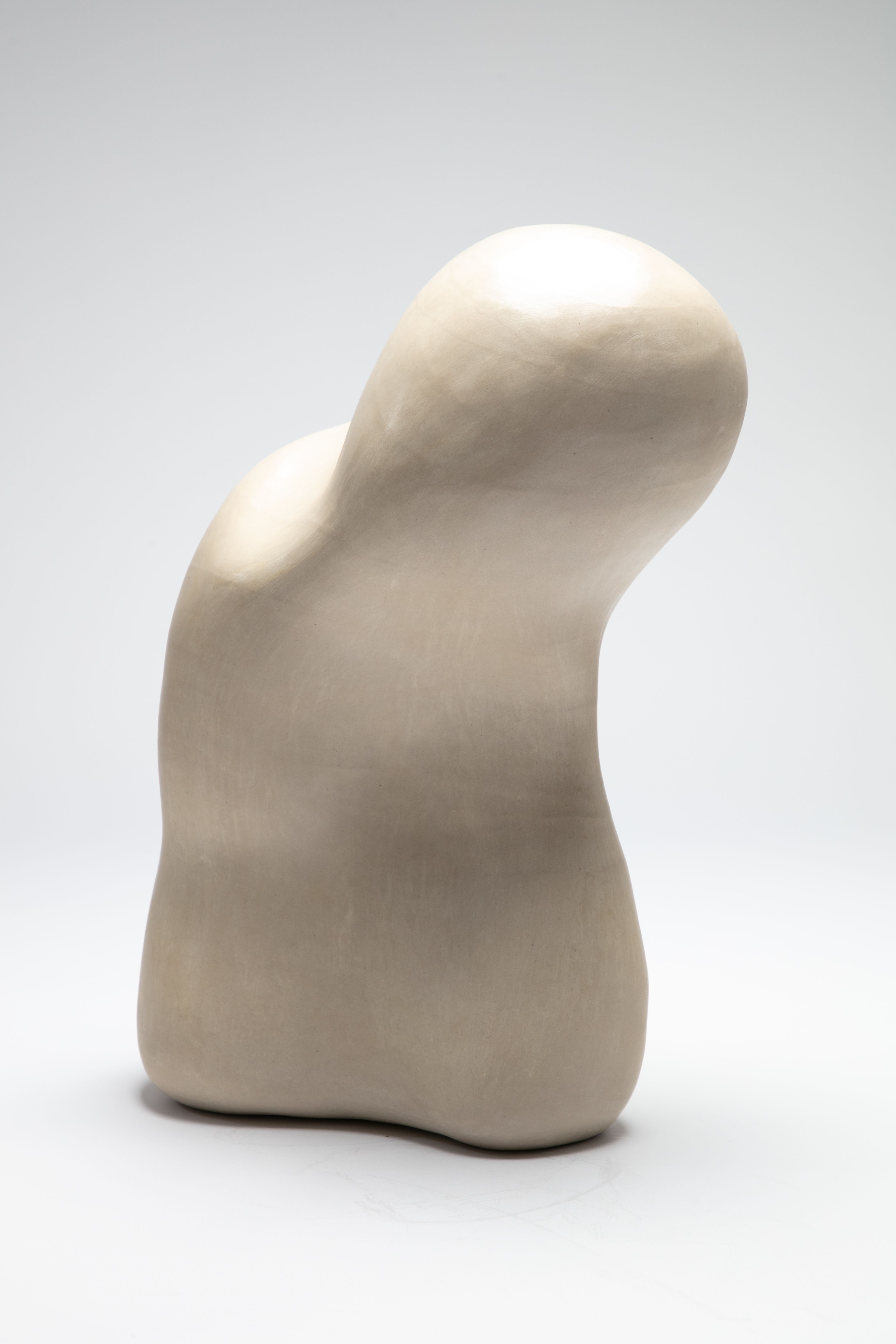 A white, organically shaped sculpture