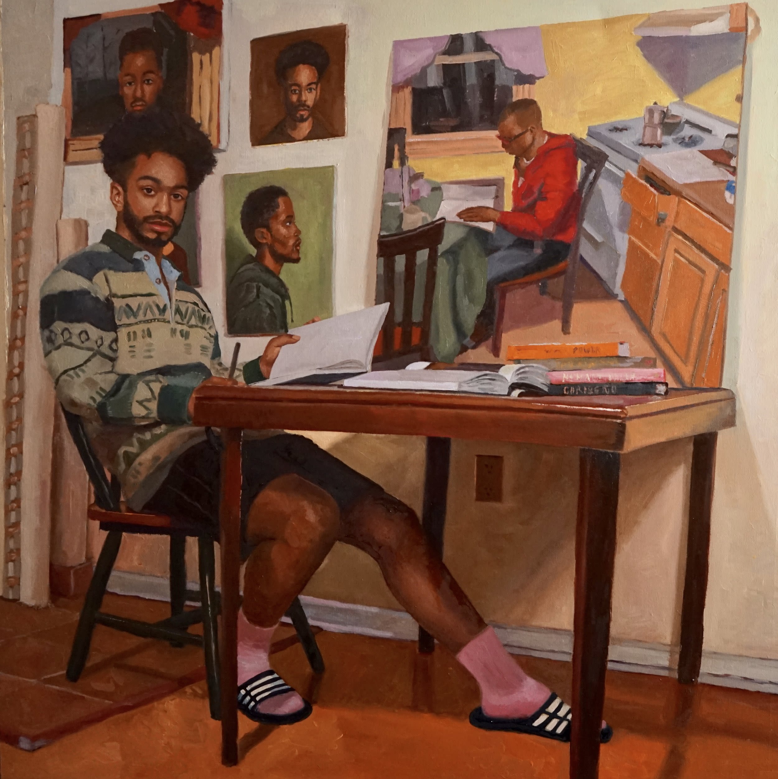 A painting of a young man in a sweater, shorts, and adidas slides sitting at a table, with paintings of men on the wall behind him