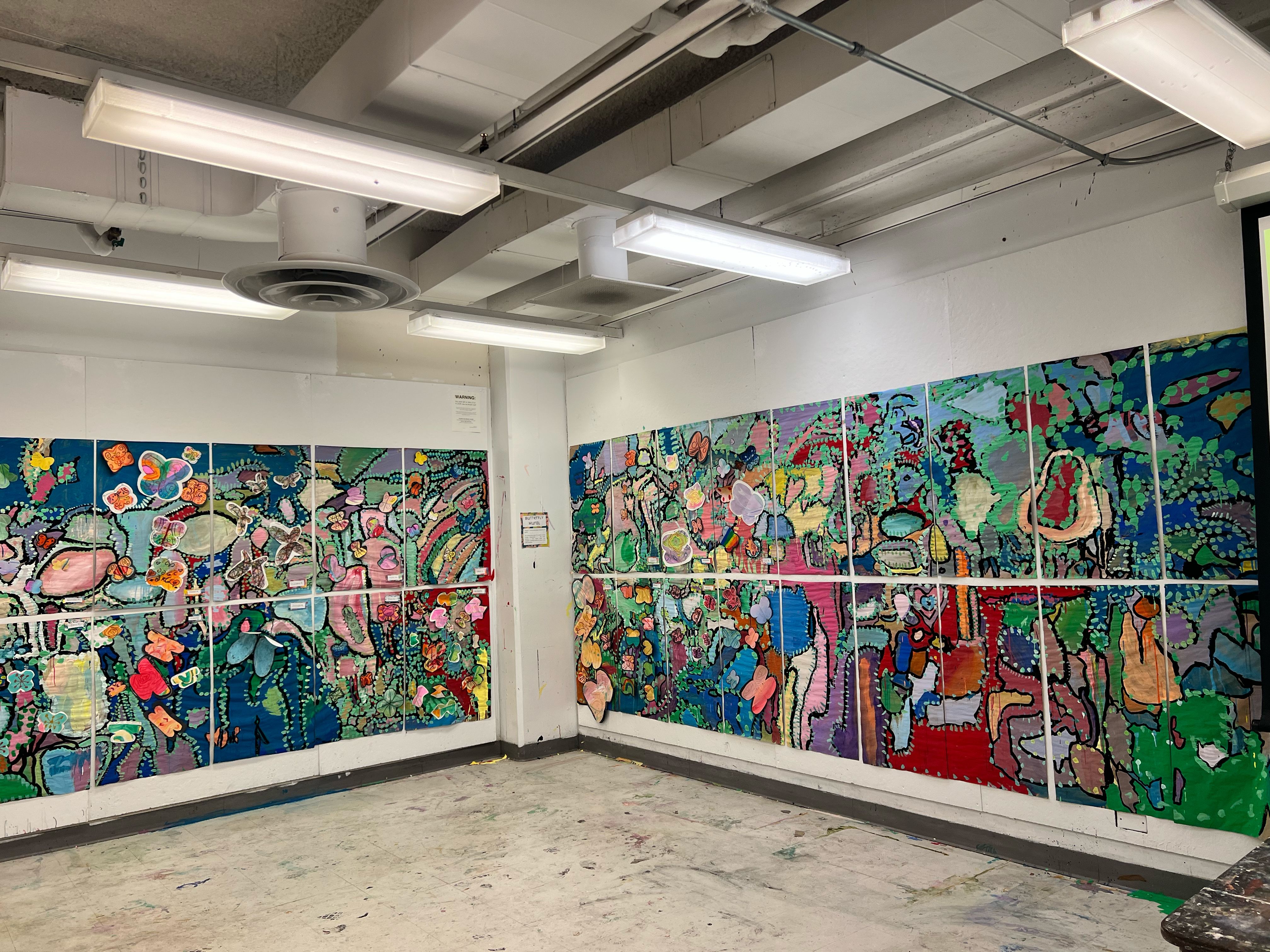 The finished mural spanning two walls