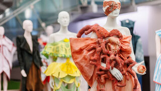 Mannequins sporting student designs.