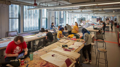 Students working on projects in SAIC's fiber studio