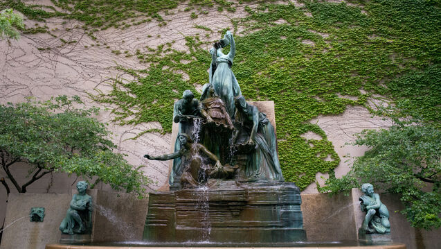 Wide shot of the Fountain of the Great Lakes, a fountain featuring oxidized copper statues