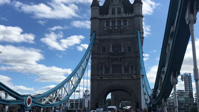 Students walking on London Bridge.