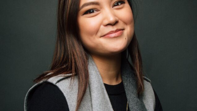 Headshot of a person indoors