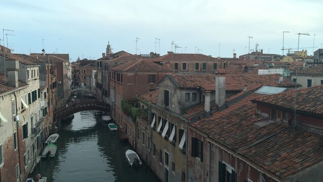 Canal view of Venice, rooftops, blue sky