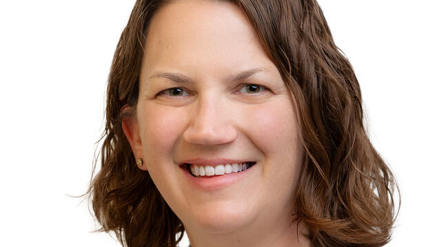 A headshot of Emily Lenz, director and nurse practitioner