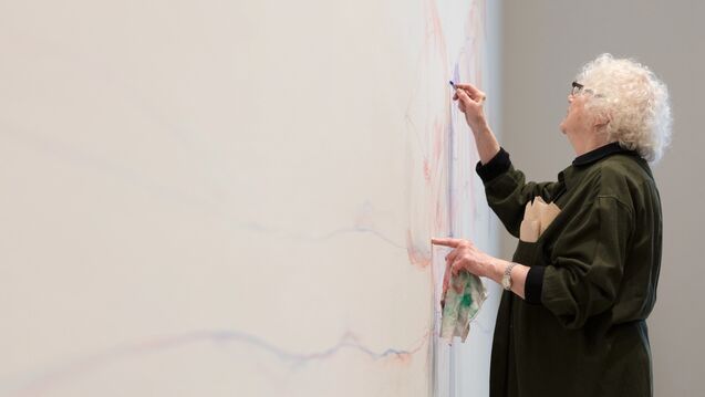 Gladys Nilsson works on a commissioned mural in the Modern Cafe at the Art Institute earlier in 2025.