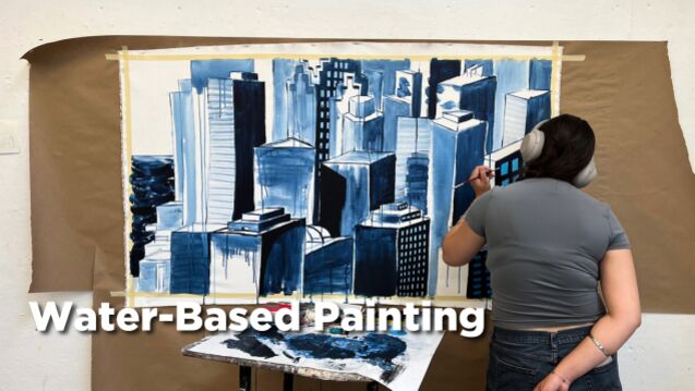 A person painting a bluescale cityscape. Text reads: "Water-Based Painting."