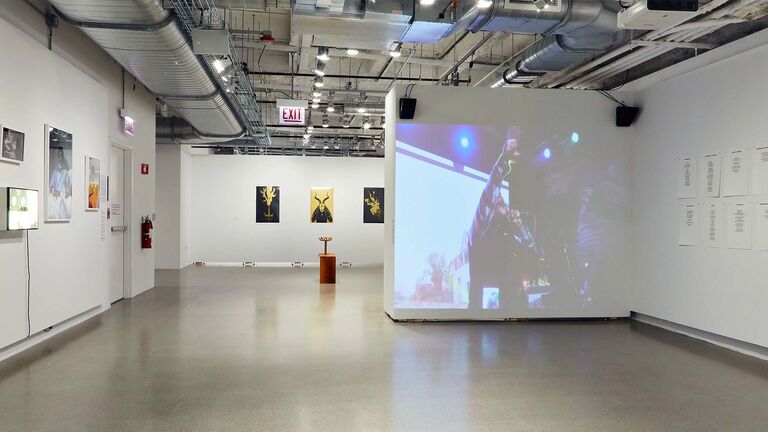 An image of a large gallery space with student artwork.
