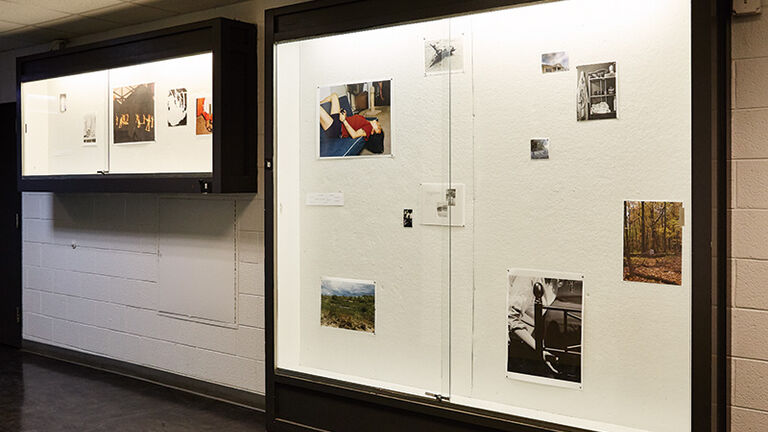 Photography department hallway featuring student work.