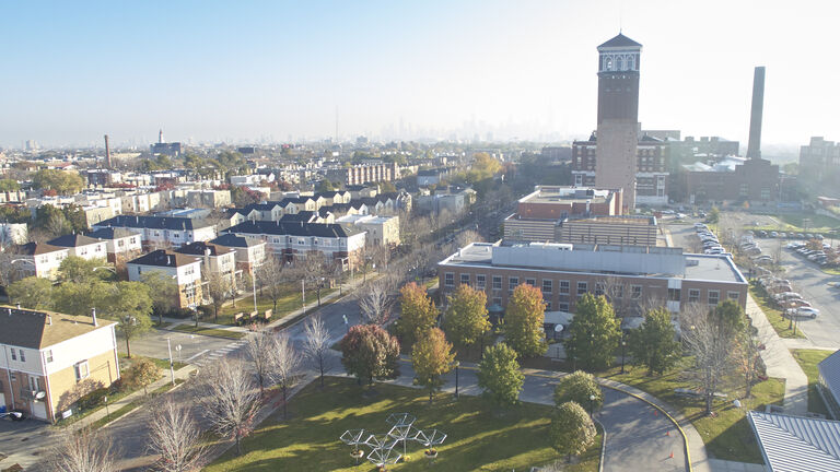 Aerial wideshot overlooking Chicago’s North Lawndale neighborhood with Nichols Tower standing tall above the scene.
