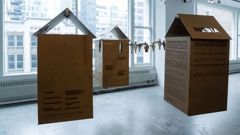 Writing installation cardboard houses
