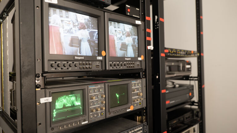 A detailed image of various equipment in the Video Data Bank office. 