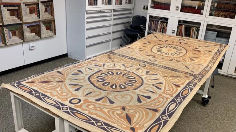 Beige and navy patterned fabric on table