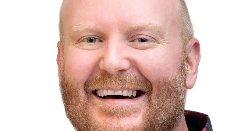 A headshot of Robert Stines