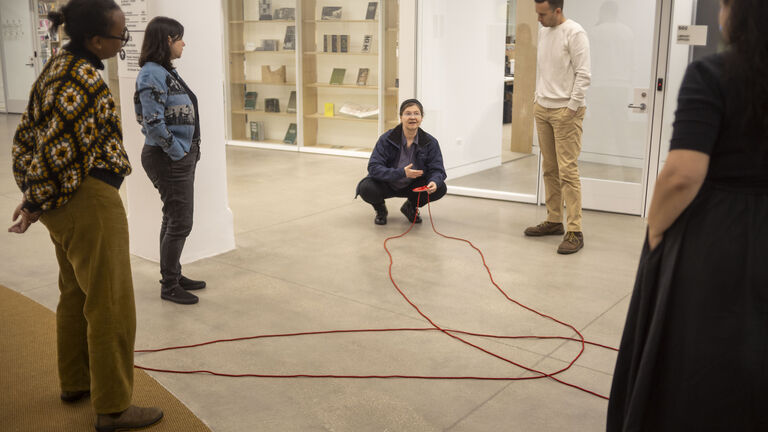 Five People Engaged in Activity