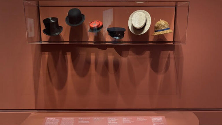 hats at an art exhibit