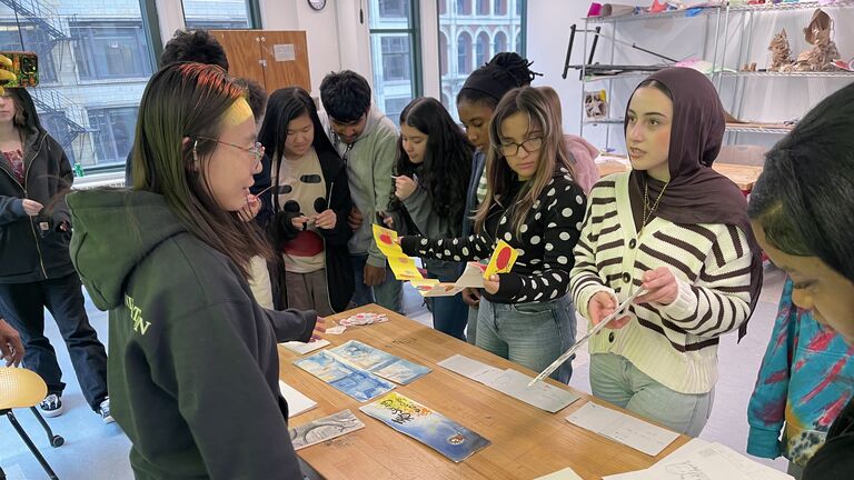 Students view and discss artwork.