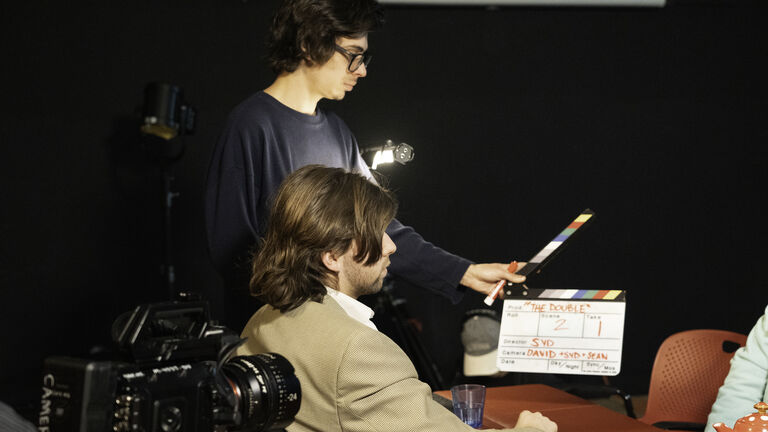 Two people working on a film set