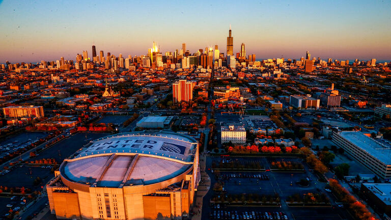 Chicago skyline at sunset over the United Center