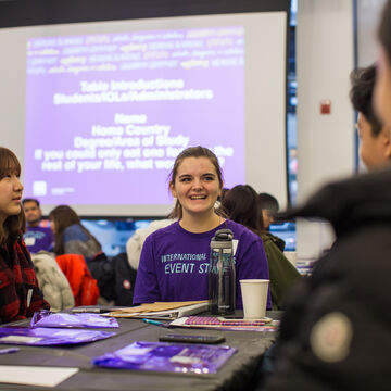 Students talk amongst each other at an international affairs event