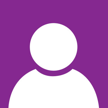A silhouette of a person against a purple background. 