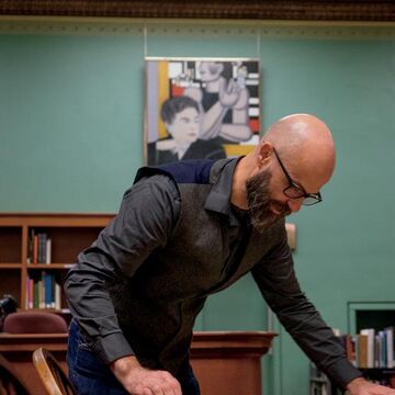 An image of Nicholas Lowe working in his studio. 