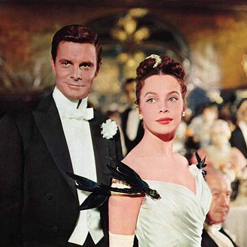 A still from the movie Gigi showing Leslie Caron and Louis Jourdan. 
