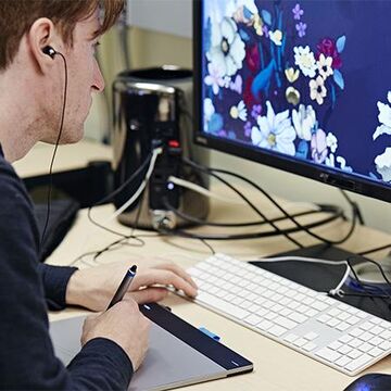 A student using a computer.