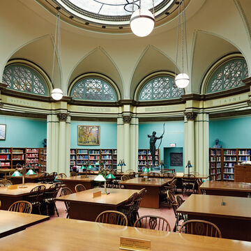 Wide shot of a large, classical library