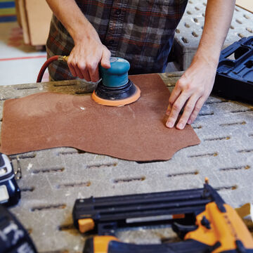 Student using a sander