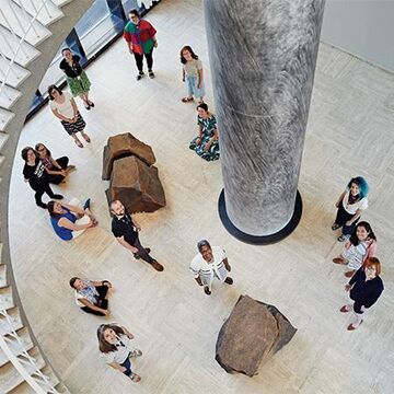 An image of a group of people in the Art Institute of Chicago.